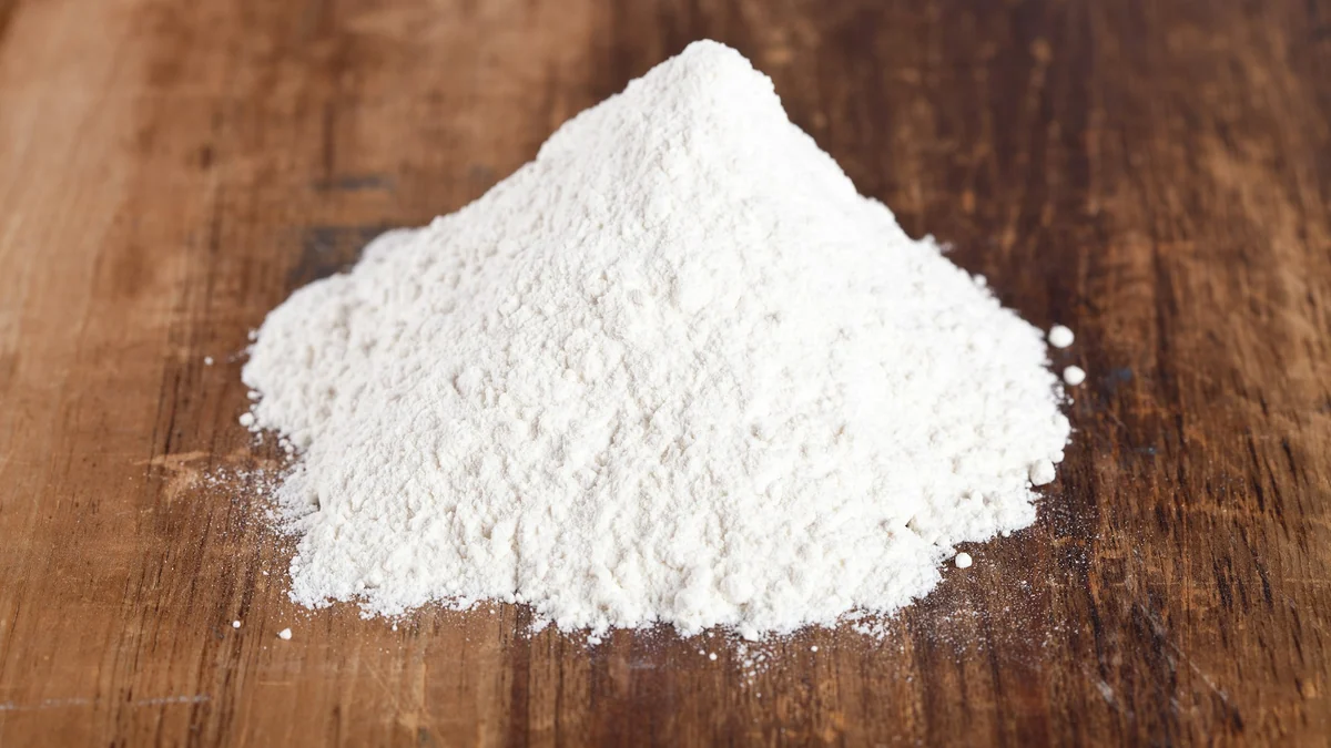 Illustrative photograph of unlabelled white powder on wood for N-Acetyl L-Tyrosine